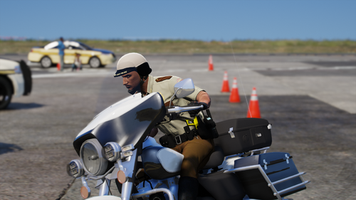 Could contain: outdoor, tire, vehicle, motorcycle, wheel, land vehicle, road, person, auto part, helmet, motorsport, ground