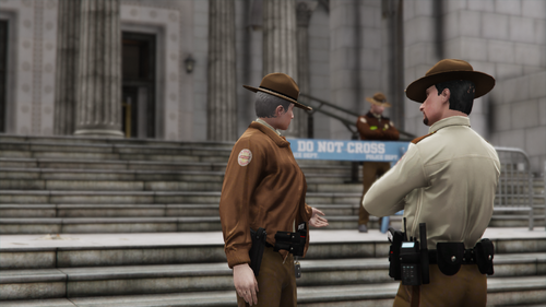 Could contain: clothing, person, building, fashion accessory, fedora, man, outdoor, cowboy hat, sun hat, street, hat, military uniform, wearing, people, officer