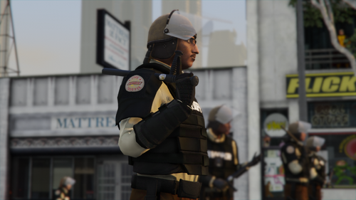 Could contain: clothing, building, person, outdoor, uniform, military uniform, officer