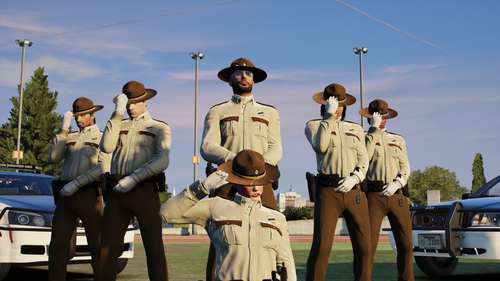 Could contain: outdoor, sky, clothing, person, vehicle, car, land vehicle, military uniform, man, law enforcement, footwear, uniform, police, group, people, officer, standing, military