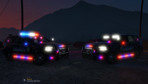 Could contain: vehicle, land vehicle, outdoor, wheel, sky, tire, transport, mountain, auto part, car, automotive lighting, road, night, light, parked, ground