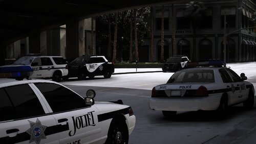 Could contain: vehicle, land vehicle, wheel, outdoor, car, transport, tire, law enforcement, police car, building, full-size car, ford crown victoria police interceptor, road, vehicle registration plate, street, parked, police