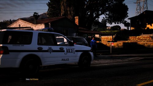 Could contain: vehicle, land vehicle, outdoor, transport, wheel, sky, tree, car, tire, building, emergency vehicle, emergency service, auto part, road, van, street, police, parked, light