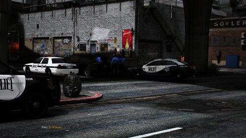 Could contain: vehicle, land vehicle, building, wheel, outdoor, text, tire, road, street, auto part, police, car, city