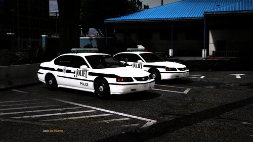 Could contain: vehicle, land vehicle, outdoor, wheel, transport, full-size car, road, police car, law enforcement, building, car, mid-size car, sedan, vehicle registration plate, ford crown victoria police interceptor, street, police, parked