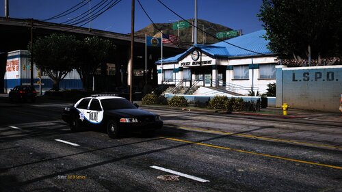 Could contain: outdoor, vehicle, land vehicle, road, car, wheel, sky, building, street, tire, police, parked