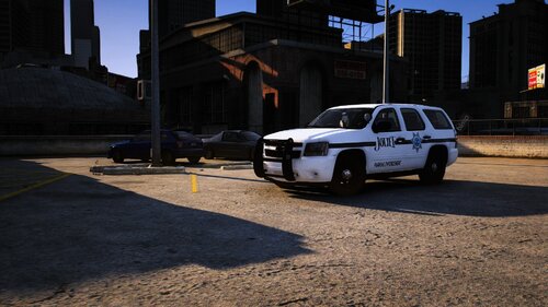 Could contain: vehicle, land vehicle, outdoor, wheel, sky, building, tire, ground, car, road, street, parked, city