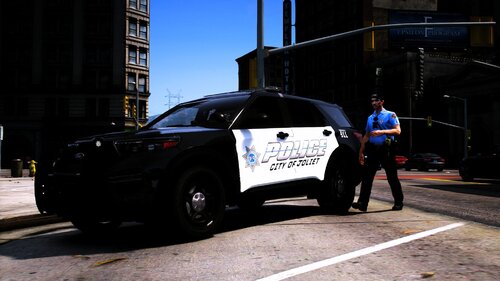 Could contain: vehicle, land vehicle, wheel, outdoor, text, tire, building, law enforcement, road, police car, mid-size car, full-size car, auto part, police, street, car, officer