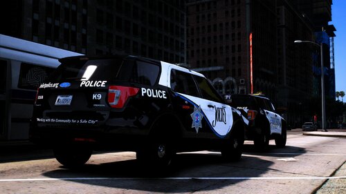 Could contain: vehicle, land vehicle, wheel, outdoor, building, tire, transport, motorsport, auto part, text, road, automotive exterior, automotive design, car, police, street, racing, rally