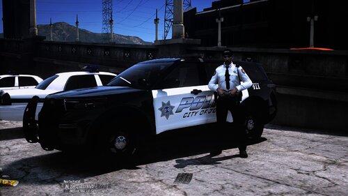 Could contain: vehicle, outdoor, land vehicle, wheel, tire, auto part, text, road, automotive exterior, transport, automotive design, police, ground, car, street