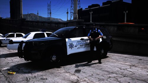 Could contain: outdoor, vehicle, wheel, land vehicle, tire, sky, auto part, text, car, ground, road, transport, police, parked, street