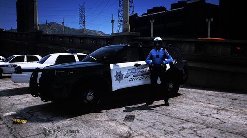 Could contain: vehicle, outdoor, land vehicle, wheel, tire, auto part, sky, transport, text, ground, road, police, street, car