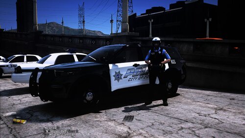 Could contain: vehicle, outdoor, land vehicle, wheel, tire, sky, auto part, text, transport, ground, road, parked, street, police, car