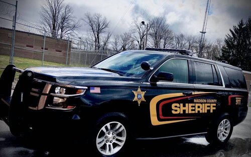 Could contain: land vehicle, vehicle, wheel, outdoor, transport, tire, sky, car, auto part, full-size car, bumper, automotive exterior, sport utility vehicle, vehicle registration plate, roof rack, automotive light bulb, rim, mid-size car, ford, sedan, parked, police