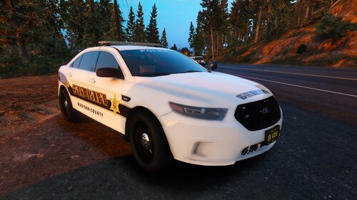 Could contain: vehicle, land vehicle, wheel, outdoor, tire, police car, full-size car, law enforcement, bumper, auto part, mid-size car, police, car, ford, text, road