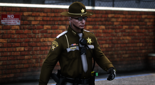 Could contain: clothing, person, military uniform, building, human face, security, man, law enforcement, police officer, outdoor, wearing, uniform, officer