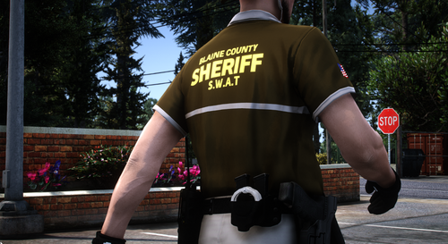 Could contain: outdoor, clothing, person, tree, man, street, wearing