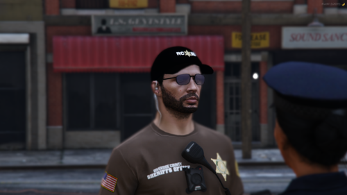 Could contain: human face, clothing, person, man, fashion accessory, goggles, sunglasses, glasses, building, cap, eyewear, outdoor, male person, headgear, street, wearing