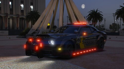 Could contain: vehicle, land vehicle, wheel, outdoor, automotive design, sports sedan, automotive lighting, tire, mid-size car, auto part, full-size car, road, sports car, transport, performance car, ground, light, car, night