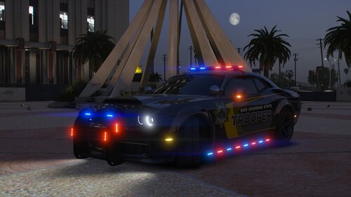 Could contain: vehicle, land vehicle, wheel, outdoor, sports car, automotive design, car, sports sedan, automotive lighting, road, performance car, ground, light, night