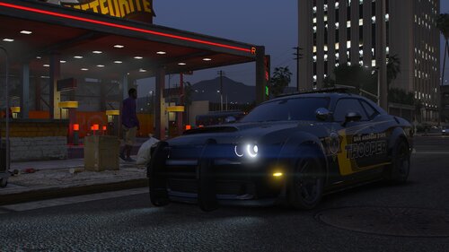 Could contain: vehicle, land vehicle, wheel, building, outdoor, luxury vehicle, sports sedan, automotive design, text, mid-size car, sports car, performance car, ground, night, road, light, car, street, supercar