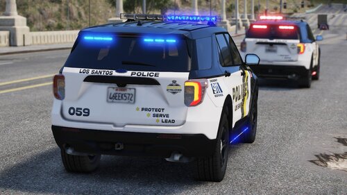 Could contain: land vehicle, vehicle, text, wheel, outdoor, vehicle registration plate, tire, police car, road, transport, automotive exterior, law enforcement, auto part, emergency vehicle, ford, motor vehicle, emergency service, mode of transport, police van, emergency, bumper, street, car, van, police