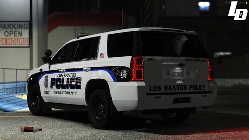 Could contain: text, vehicle, land vehicle, wheel, tire, auto part, bumper, automotive exterior, police car, vehicle registration plate, sport utility vehicle, law enforcement, motor vehicle, automotive tire, mitsubishi, automotive light bulb, ford, ford motor company, transport, road, outdoor, police, van, parked, car