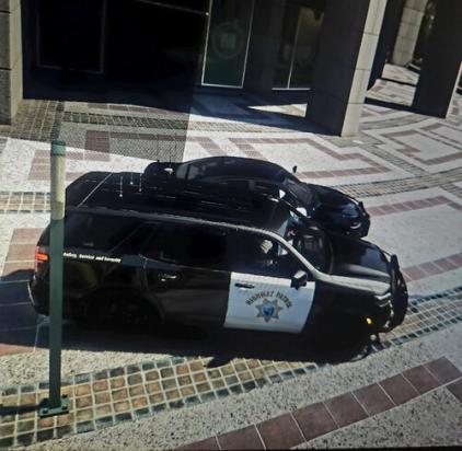 Could contain: land vehicle, vehicle, outdoor, wheel, tire, text, auto part, ground, building, automotive exterior, meter, parked, sidewalk, car, street