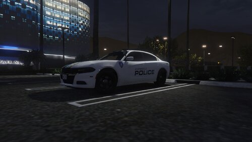 Could contain: vehicle, land vehicle, transport, wheel, automotive design, car, outdoor, building, sports car, sports sedan, tire, road, ground, night, light