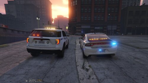 Could contain: vehicle, land vehicle, outdoor, text, wheel, building, transport, road, vehicle registration plate, car, street, sky, automotive lighting, light, ambulance, ground, city, police