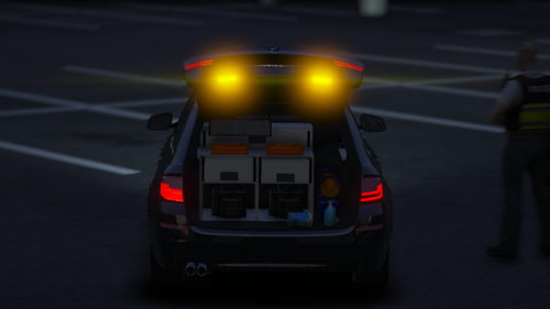 Could contain: vehicle, land vehicle, road, wheel, transport, outdoor, auto part, automotive tail & brake light, automotive lighting, car, person, street, light