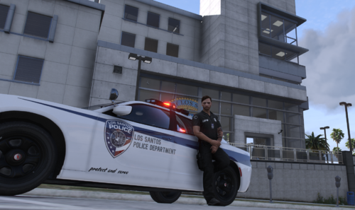 Could contain: outdoor, vehicle, land vehicle, wheel, sky, building, tire, auto part, car, transport, road, police, person, officer