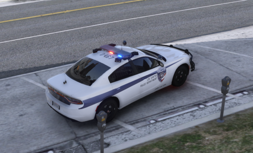 Could contain: vehicle, land vehicle, wheel, transport, outdoor, road, car, police car, police, law enforcement, full-size car, emergency service, street, emergency