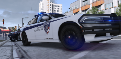 Could contain: vehicle, land vehicle, wheel, outdoor, sky, tire, transport, road, auto part, automotive design, motorsport, ground, police, car, street, drift