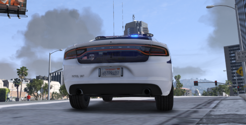 Could contain: sky, text, outdoor, vehicle, land vehicle, road, car, automotive design, wheel, street, ground, driving