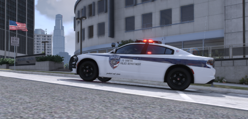 Could contain: land vehicle, vehicle, transport, wheel, outdoor, full-size car, building, sports sedan, road, mid-size car, police car, car, law enforcement, street, police