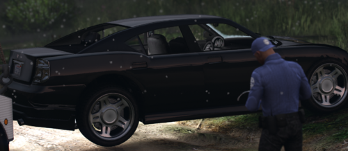 Could contain: wheel, vehicle, land vehicle, outdoor, transport, tire, car, person, man, alloy wheel, hood, vehicle door, auto part, sedan, luxury vehicle, rim, clothing, automotive design, ground, grass, parked