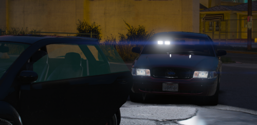 Could contain: vehicle, land vehicle, auto part, outdoor, wheel, automotive exterior, automotive lighting, tire, motor vehicle, automotive design, automotive tail & brake light, windshield, parked, car, parking, ground, night