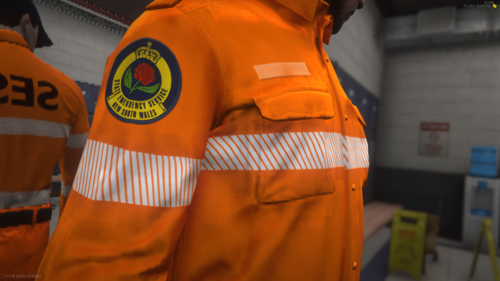 Could contain: workwear, clothing, firefighter, high-visibility clothing, orange, person, yellow, indoor, protective garment, standing