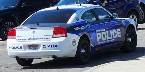 Could contain: text, vehicle, land vehicle, wheel, tire, auto part, outdoor, vehicle registration plate, full-size car, bumper, road, automotive exterior, mid-size car, law enforcement, police car, sports sedan, transport, police, automotive light bulb, car, street