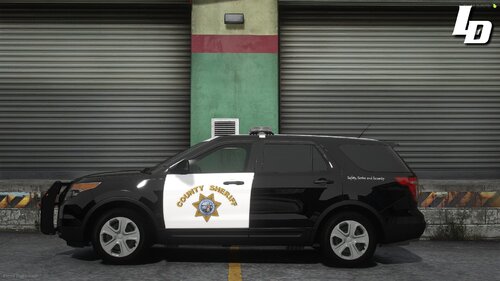 Could contain: vehicle, land vehicle, wheel, tire, police, outdoor, building, auto part, text, road, automotive exterior, law enforcement, motor vehicle, fender, street, car