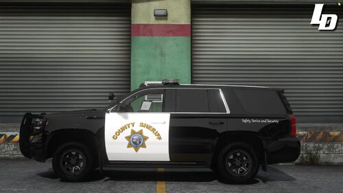 Could contain: wheel, vehicle, land vehicle, tire, outdoor, building, text, auto part, transport, automotive exterior, bumper, sport utility vehicle, motor vehicle, fender, road, street, parked, car, police, van