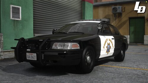 Could contain: vehicle, land vehicle, text, wheel, tire, transport, outdoor, bumper, building, automotive exterior, auto part, law enforcement, vehicle registration plate, full-size car, police car, ford crown victoria police interceptor, road, street, black, police, car