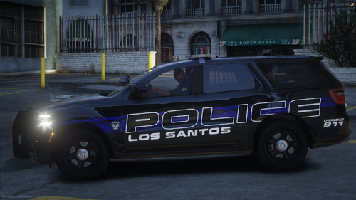 Could contain: vehicle, land vehicle, wheel, text, transport, tire, outdoor, law enforcement, vehicle registration plate, building, police car, auto part, road, ford, street, automotive exterior, sport utility vehicle, ford crown victoria police interceptor, car, police, emergency