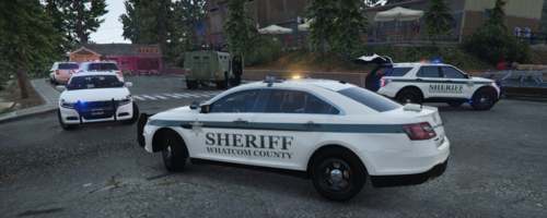 Could contain: vehicle, land vehicle, wheel, transport, text, outdoor, car, vehicle registration plate, police car, law enforcement, full-size car, tire, auto part, mid-size car, emergency vehicle, road, street, police