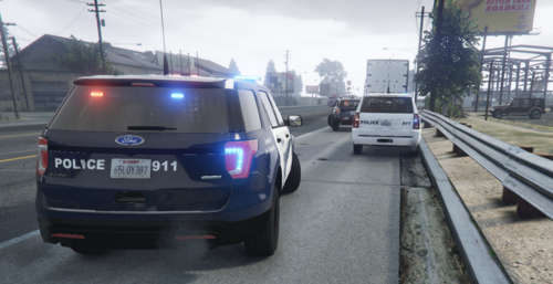 Could contain: text, land vehicle, vehicle, outdoor, sky, vehicle registration plate, wheel, road, car, motor vehicle, automotive exterior, automotive tail & brake light, auto part, tire, mode of transport, automotive lighting, transport, van, street, light, police