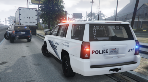 Could contain: vehicle, text, land vehicle, outdoor, wheel, transport, vehicle registration plate, tire, road, auto part, motor vehicle, automotive exterior, police, automotive tail & brake light, sport utility vehicle, family car, bumper, automotive luggage rack, roof rack, automotive parking light, automotive carrying rack, car, street, van