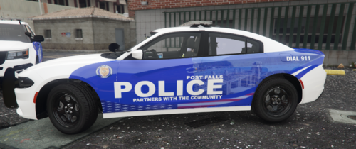 Could contain: vehicle, land vehicle, text, wheel, tire, transport, car, outdoor, auto part, police car, law enforcement, automotive exterior, police, road, street, ground, parked