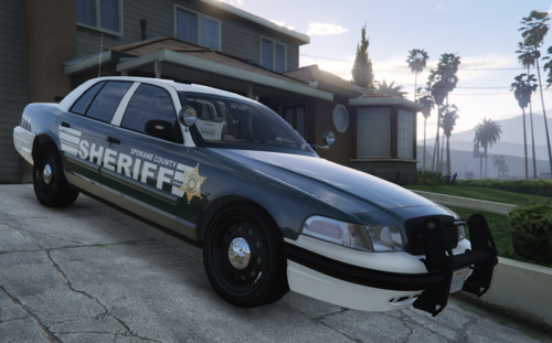 Could contain: vehicle, transport, land vehicle, wheel, outdoor, car, full-size car, police car, law enforcement, ford crown victoria police interceptor, police, sedan, tire