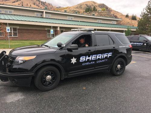 Could contain: vehicle, land vehicle, tire, wheel, outdoor, transport, auto part, bumper, sport utility vehicle, compact sport utility vehicle, motor vehicle, ford, text, mini suv, crossover suv, automotive exterior, road, car, parked, mountain, police, suv